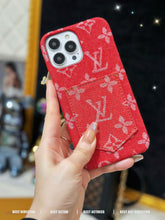 Upcycled Louis Vuitton iPhone 14 Pro wallet phone case