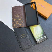 Upcycled Louis Vuitton iPhone 15 Pro Max wallet phone case