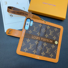 Upcycled Louis Vuitton iPhone 11 wallet phone case